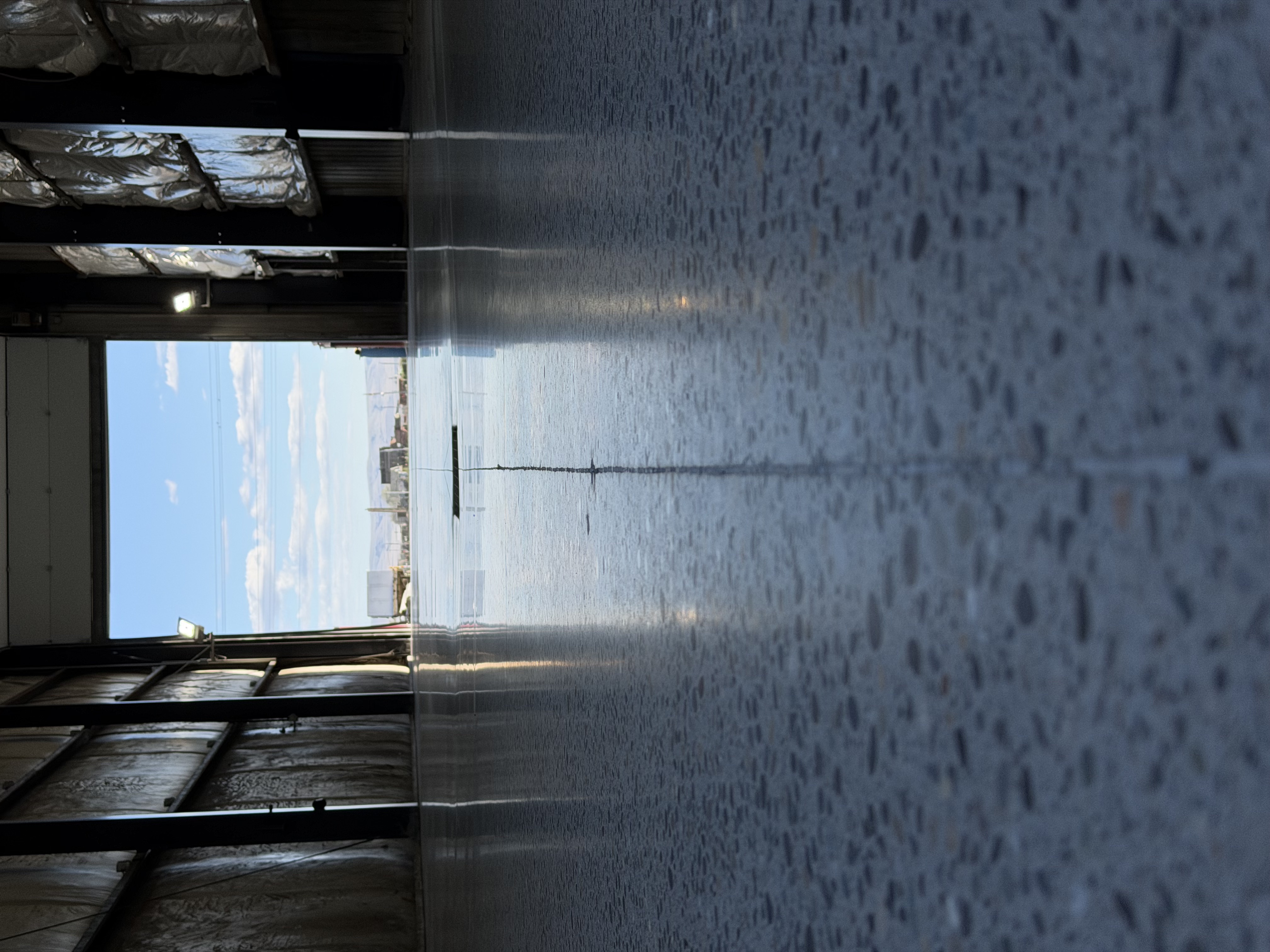 Epoxy flake floor coating in warehouse or shop