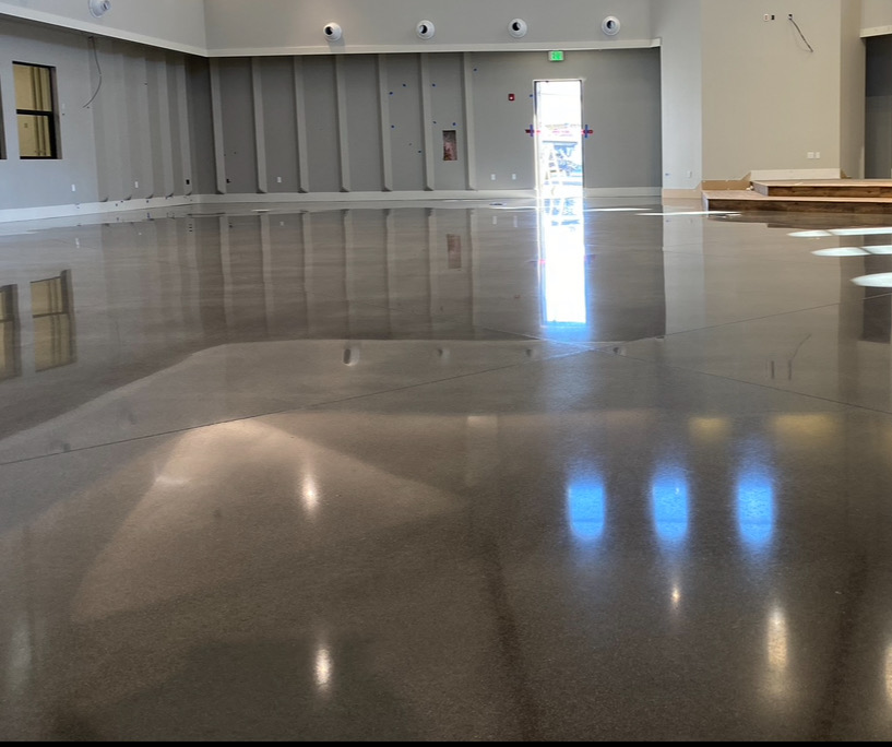 Polished concrete with mirror-like reflection in commercial space